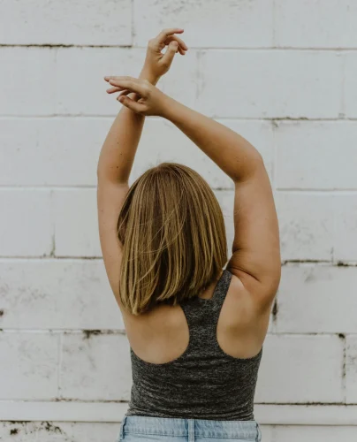 woman arms raised